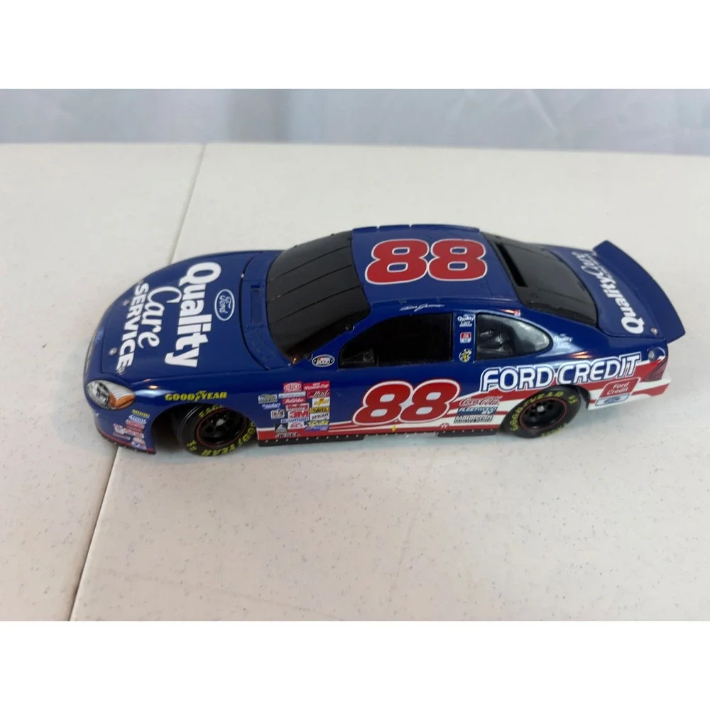 Dale Jarrett 88 Ford Quality Care Credit Taurus NASCAR 1:24 Diecast Car Blue